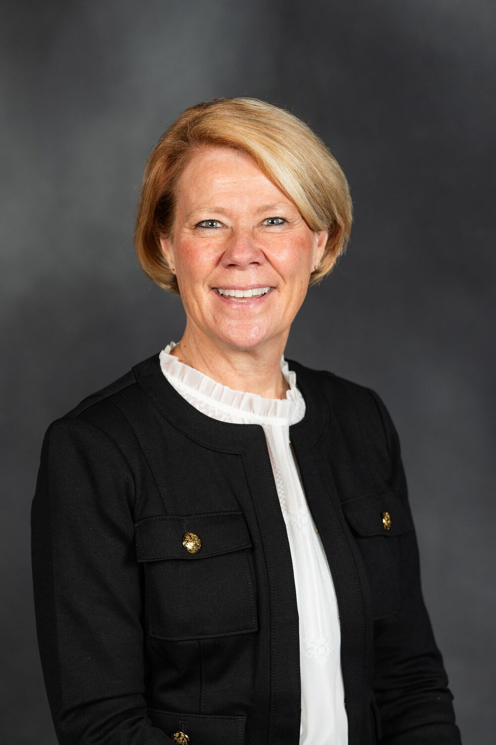 Headshot of Tena McNamara, AuD